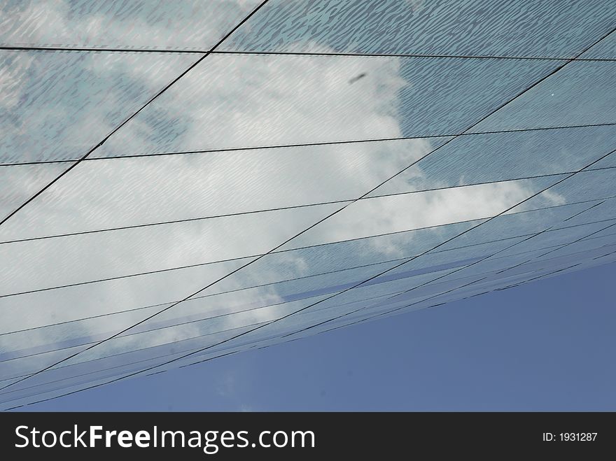 Modern Majestic Skyscraper with reflections of clouds