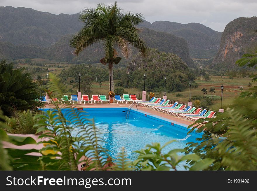 Swimming pool surrounded by beautiful mountainscape in Vinales, Cuba. Swimming pool surrounded by beautiful mountainscape in Vinales, Cuba