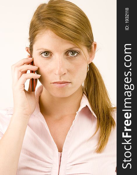 A Woman talking on her mobile phone. A Woman talking on her mobile phone.