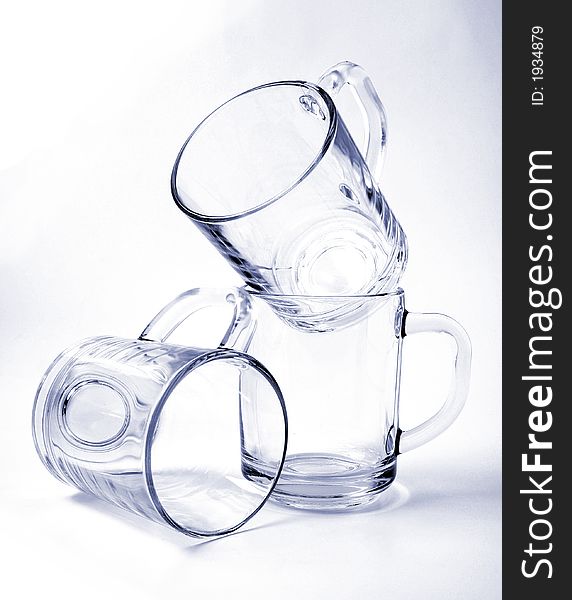 Three empty glass mugs