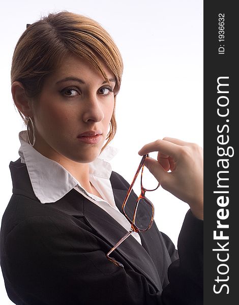 Businesswoman is holding a pair of glasses. Businesswoman is holding a pair of glasses