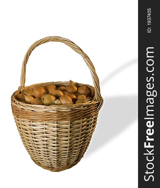 Basket with onion isolatedd on white with clipping path. Basket with onion isolatedd on white with clipping path