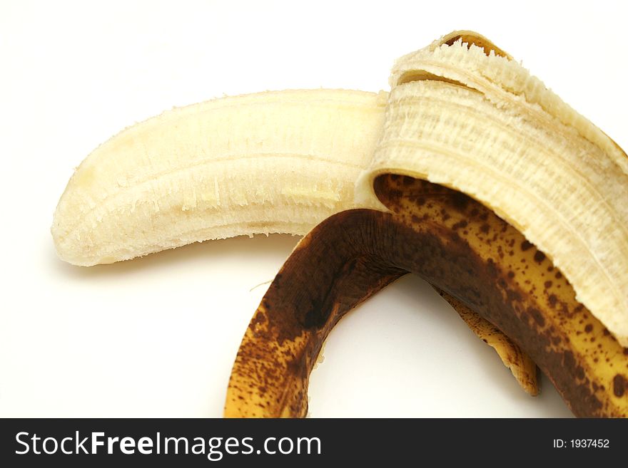 Old Banana On White