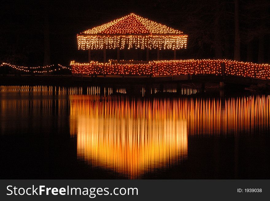 A lakeside cabana is covered with lights in Muskogee, OKLA. A lakeside cabana is covered with lights in Muskogee, OKLA.