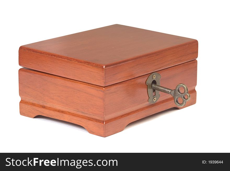 Wooden locker with the inserted key, isolated over white. Wooden locker with the inserted key, isolated over white