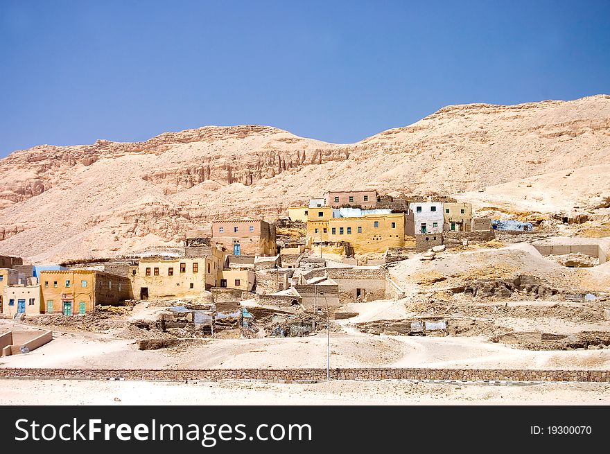 Settlement in mountains at road