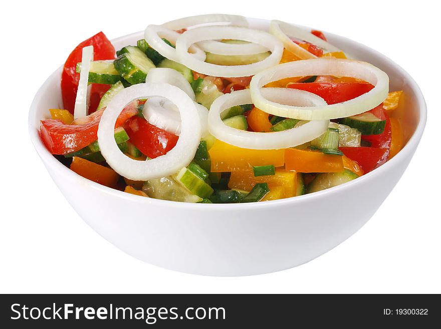 Vegetable salad with a onion isolated on white background