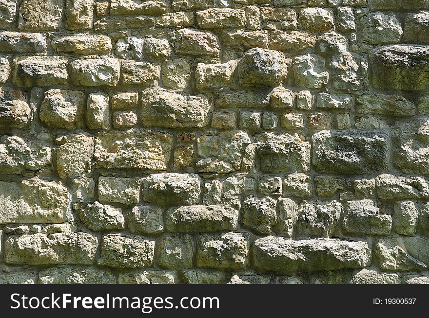 Wall of unregular antique limestones - format-filling. Wall of unregular antique limestones - format-filling
