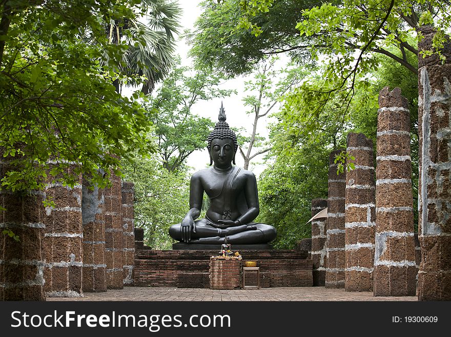 Bronze Buddha locates in the park at Ratchaburi, Thailand. Bronze Buddha locates in the park at Ratchaburi, Thailand.