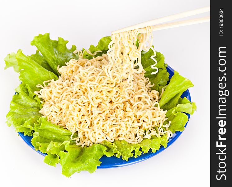 Vermicelli and lettuce. Isolated on a white bachground