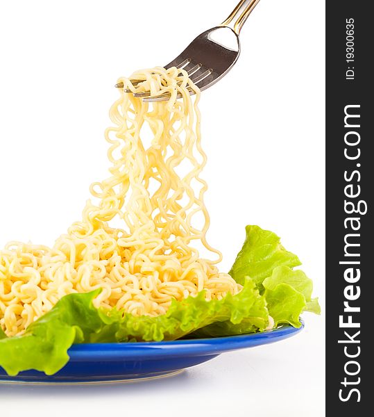 Vermicelli and lettuce. Isolated on a white bachground