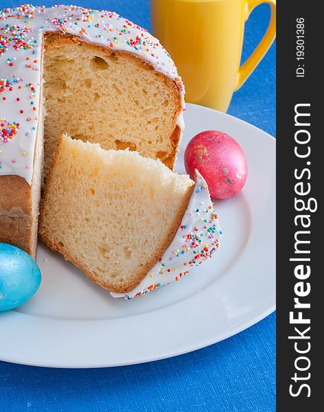 Easter cake on white plate end eggs. Easter cake on white plate end eggs.
