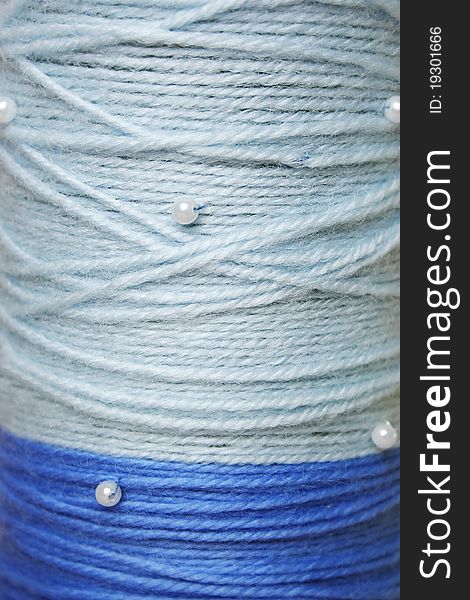 Round texture of blue woolen threadsh beads