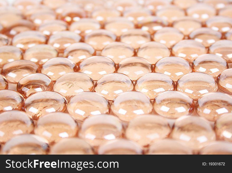 Background With Many Orange Glass Balls