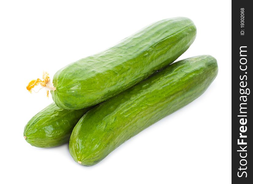 Close-up three cucumbers, isolated on white