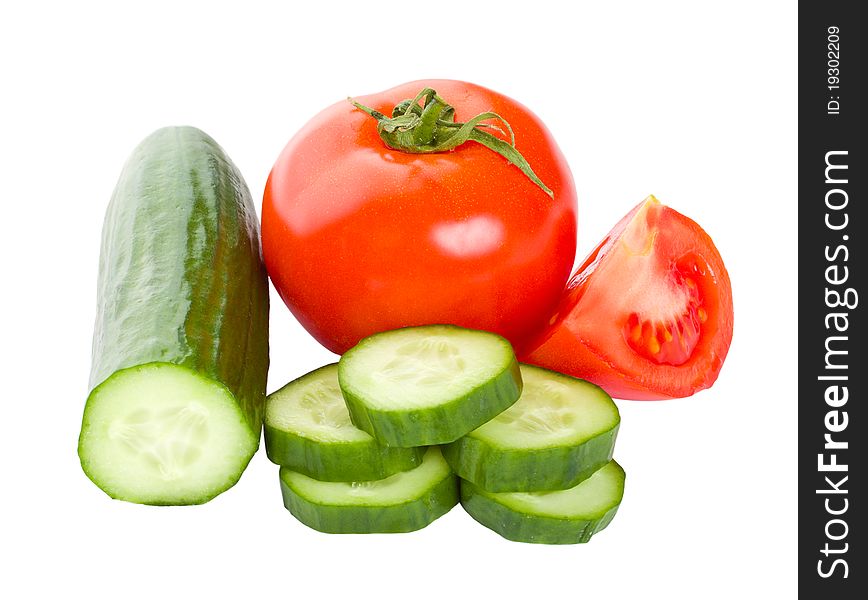 Close-up cucumbers and tomatoes, isolated on white