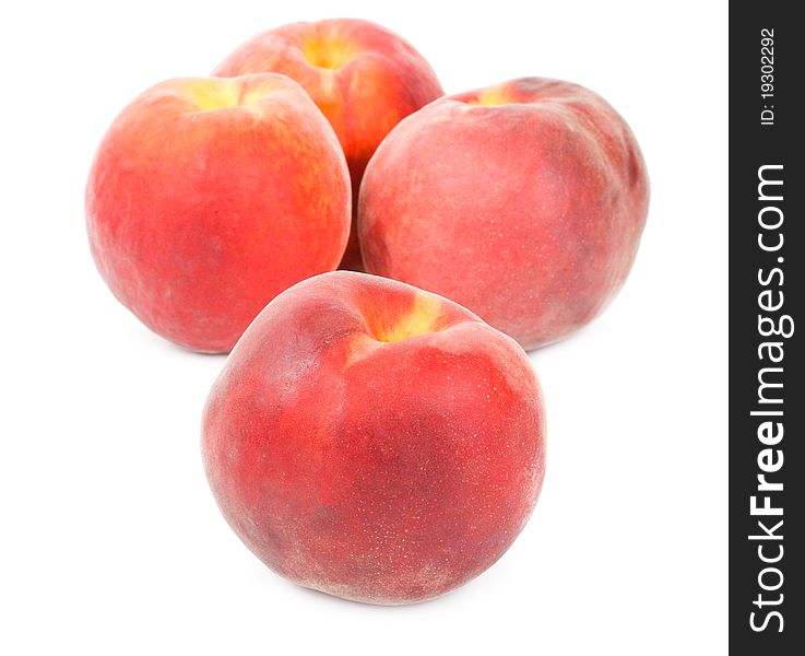Close-up peaches, isolated on white