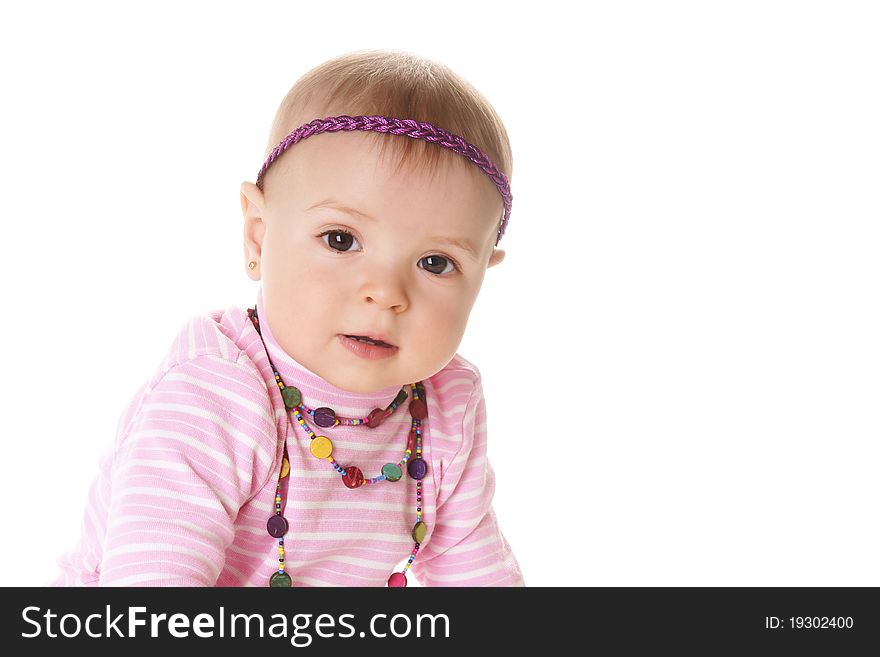 Portrait if beautiful baby girl in pink sweater isolated on white background