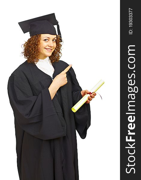 Happy graduation girl with diploma pointing right isolated over white background. Happy graduation girl with diploma pointing right isolated over white background