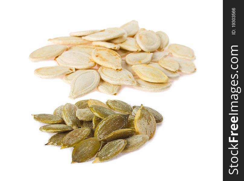 Close-up seeds of pumpkin, isolated on white