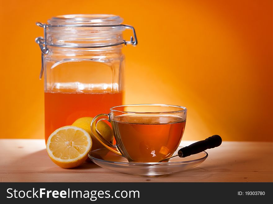 Cup of herbal tea with honey and lemon