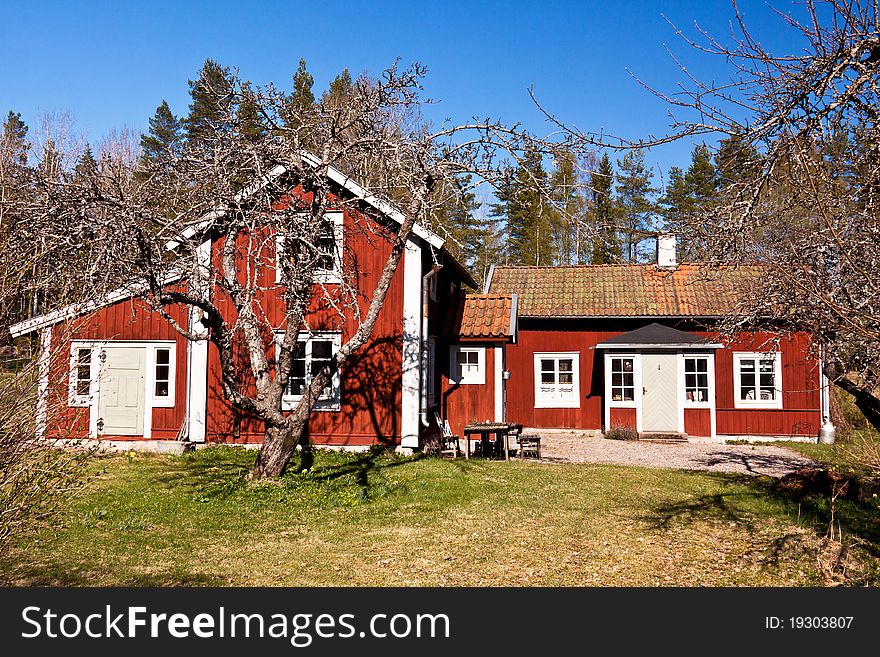 Idyllic Swedish rural house. typical old wooden, painted red and white. Idyllic Swedish rural house. typical old wooden, painted red and white.