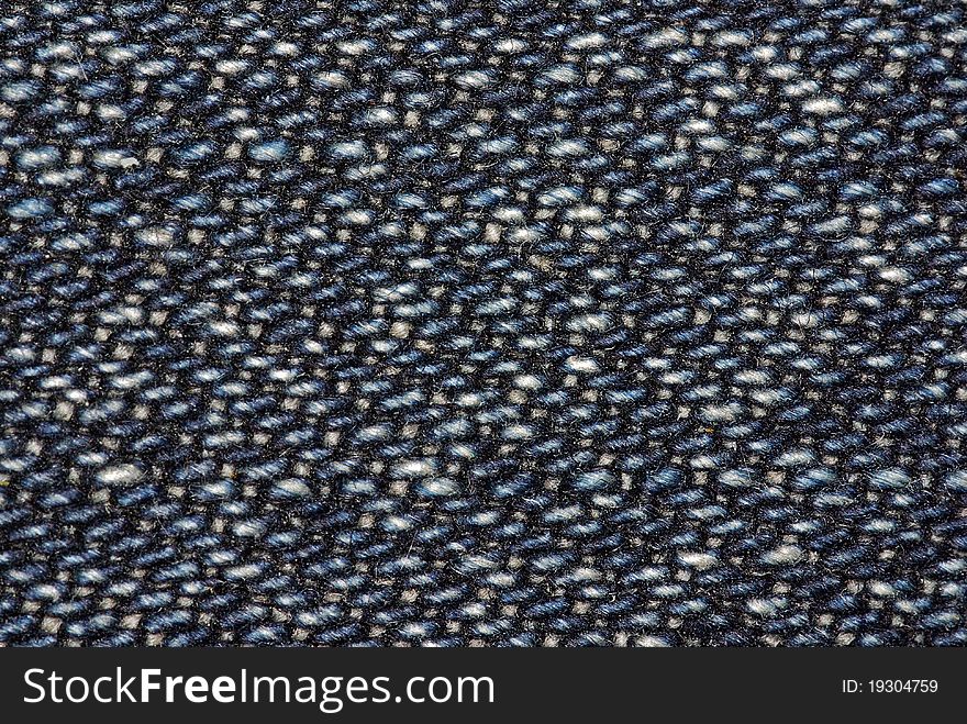 Macro of dark blue jeans fabric. Macro of dark blue jeans fabric