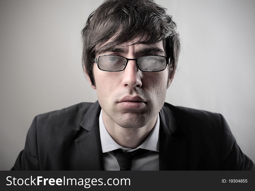 Portrait of a businessman wearing misty glasses. Portrait of a businessman wearing misty glasses