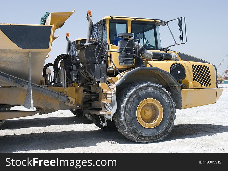 Heavy duty tipper on a construction site. Heavy duty tipper on a construction site