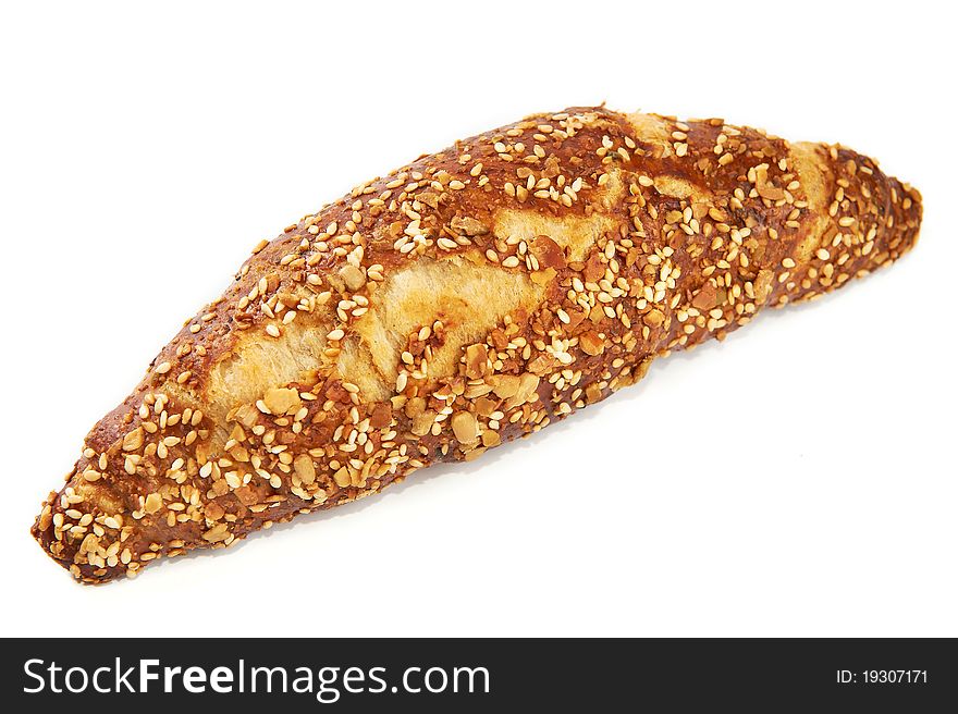 Croissant with seeds sesame isolated white background. Croissant with seeds sesame isolated white background