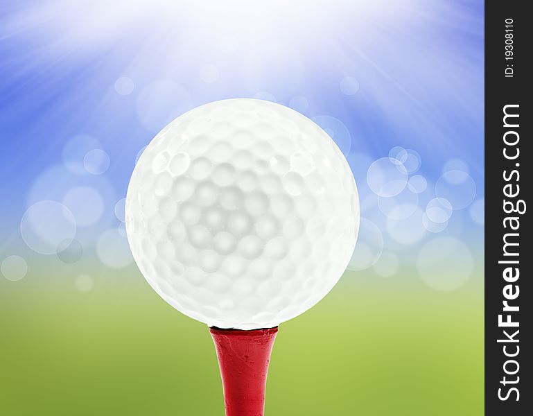 Spring background with a golf ball on a peg