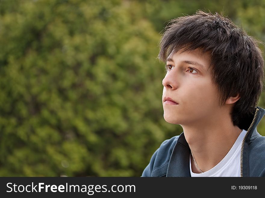 Outdoors portrait of atractive young man
