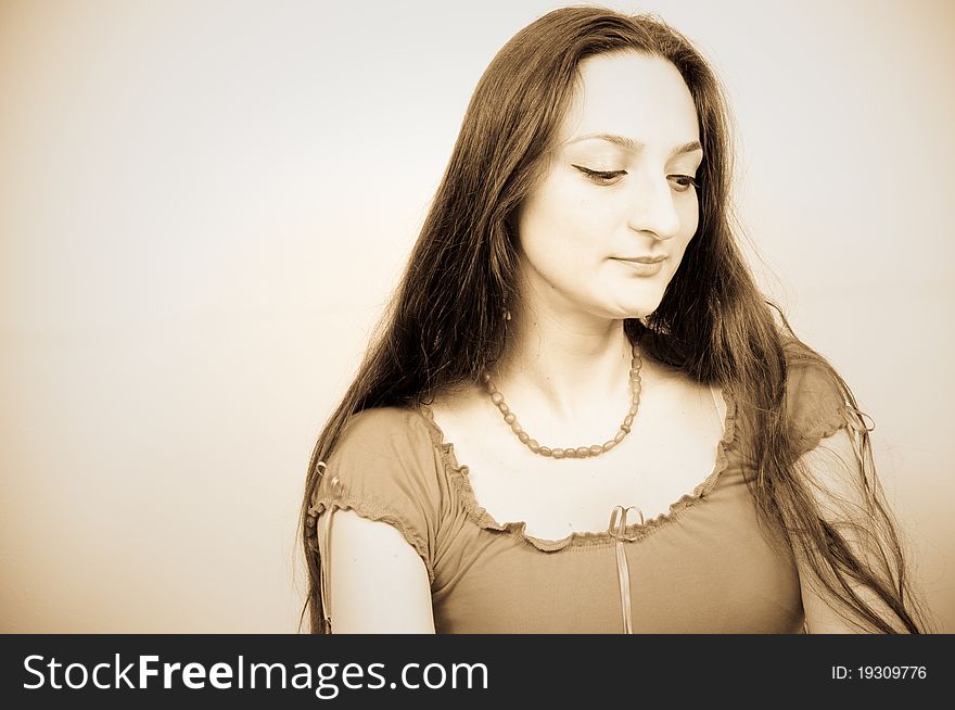 Portrait of a beautiful girl with long hair