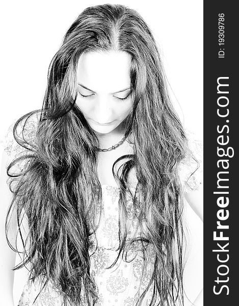 Portrait of a beautiful girl with long hair