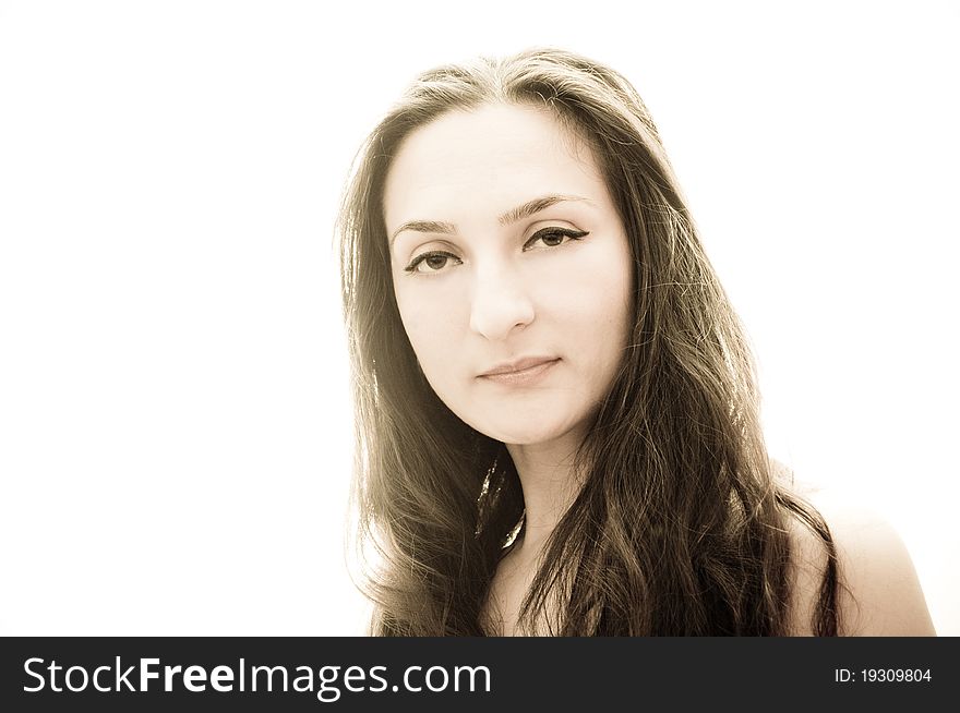 Portrait of a beautiful girl with long hair