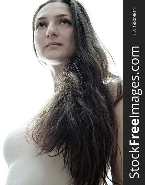 Portrait of a beautiful girl with long hair