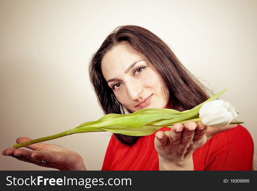 Portrait of a beautiful Girl offering you a Flower. Portrait of a beautiful Girl offering you a Flower