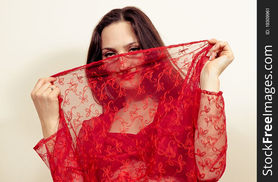 Portrait of a beautiful girl Dancing in a Red Dress