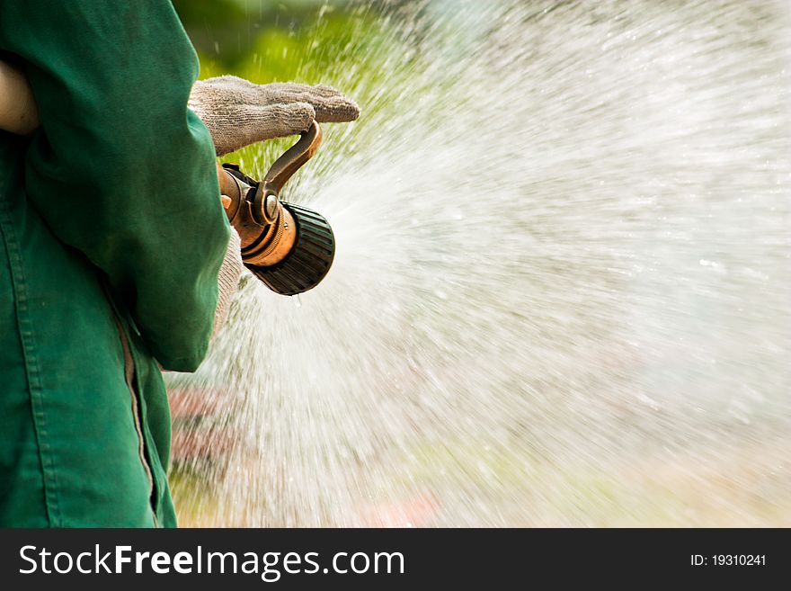 Water flow form hose of fireman. Water flow form hose of fireman