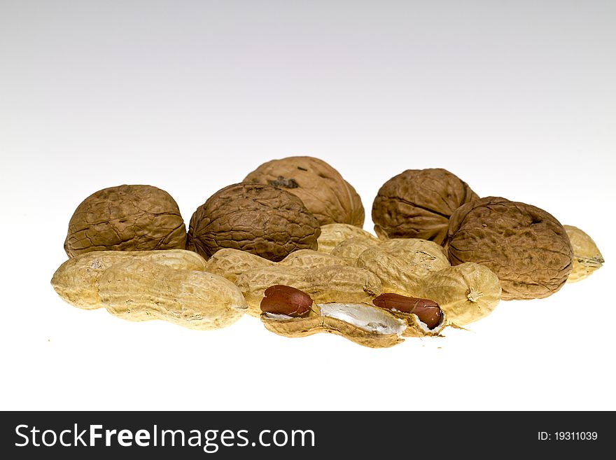 Nuts and peanuts on a white background