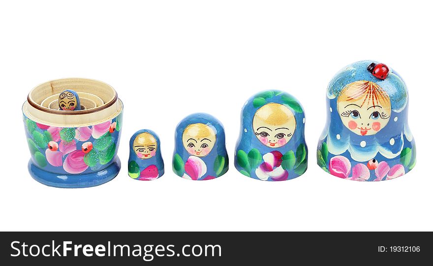 Four opened matryoshka-dolls in a row. Smallest one is in bottom of others. Four opened matryoshka-dolls in a row. Smallest one is in bottom of others.