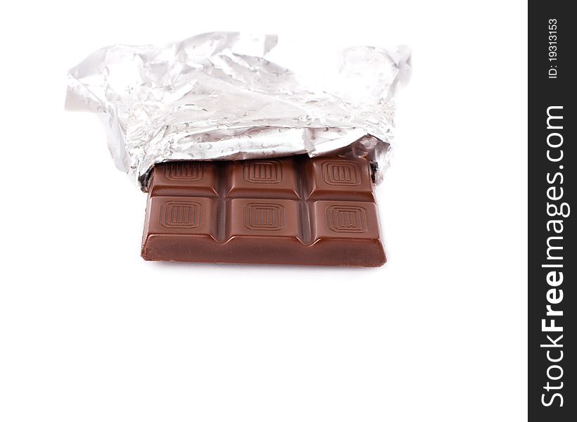 Sweet bar of chocolate isolated on the white. Sweet bar of chocolate isolated on the white