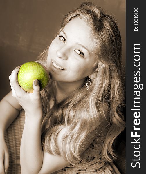 Young beautiful pretty girl with green apple. Young beautiful pretty girl with green apple