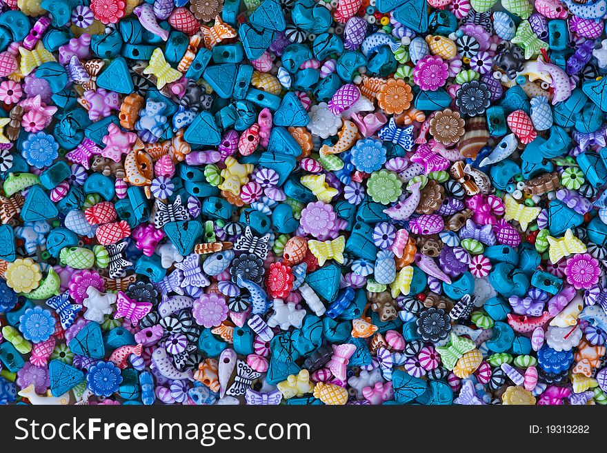 Closeup image of colorful plastic beads for backgrounds or textures. Closeup image of colorful plastic beads for backgrounds or textures