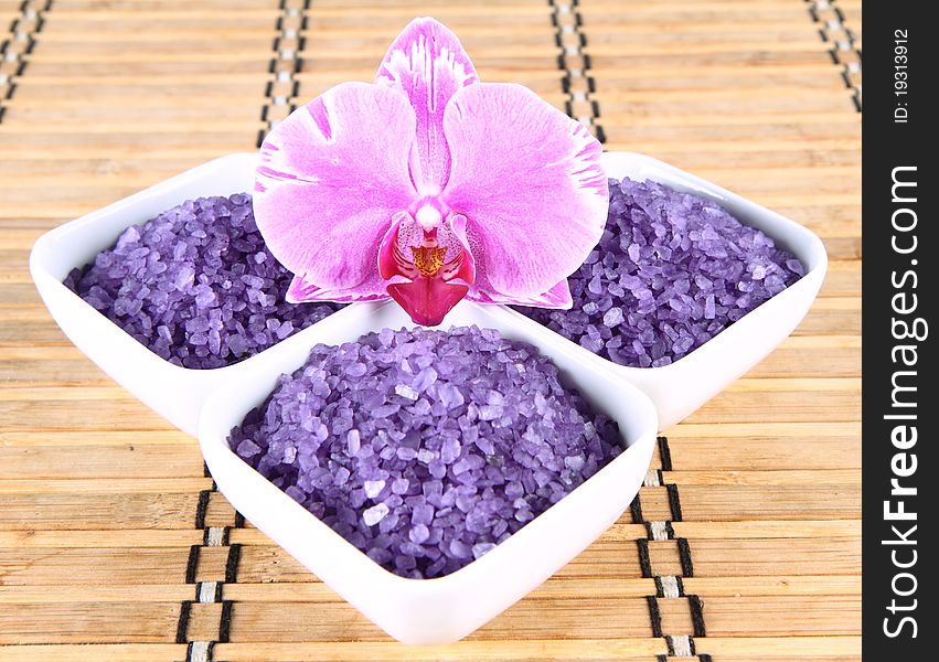 Lavender spa salt and an orchid flower