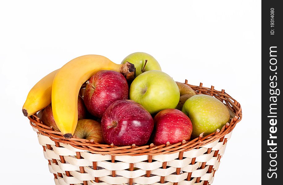 Basket with apples and bananas