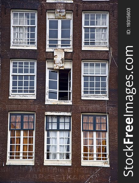 Facade of the Holland house with windows. Amsterdam. Fregment. Frontally