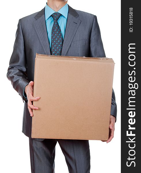 An isolated shot of a businessman carrying a paper box, business moving concept. An isolated shot of a businessman carrying a paper box, business moving concept