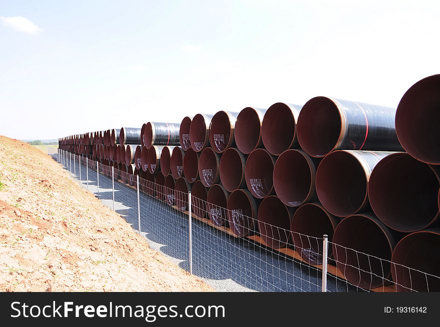 Storage of lots of huge steel pipes. Storage of lots of huge steel pipes.