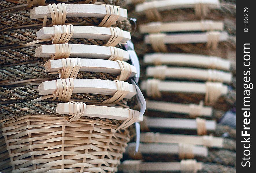 Vertical closeup image of a wicker basket